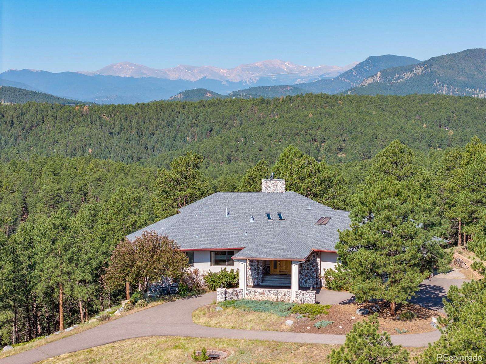 13.5 Acres of Land with Home for Sale in Evergreen, Colorado