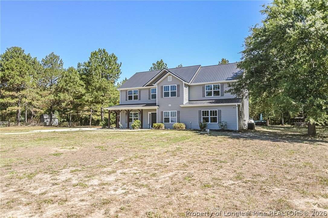 12.2 Acres of Land with Home for Sale in Laurel Hill, North Carolina