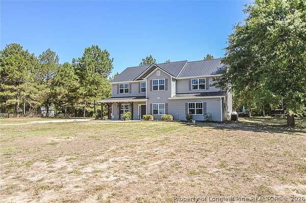 12.2 Acres of Land with Home for Sale in Laurel Hill, North Carolina