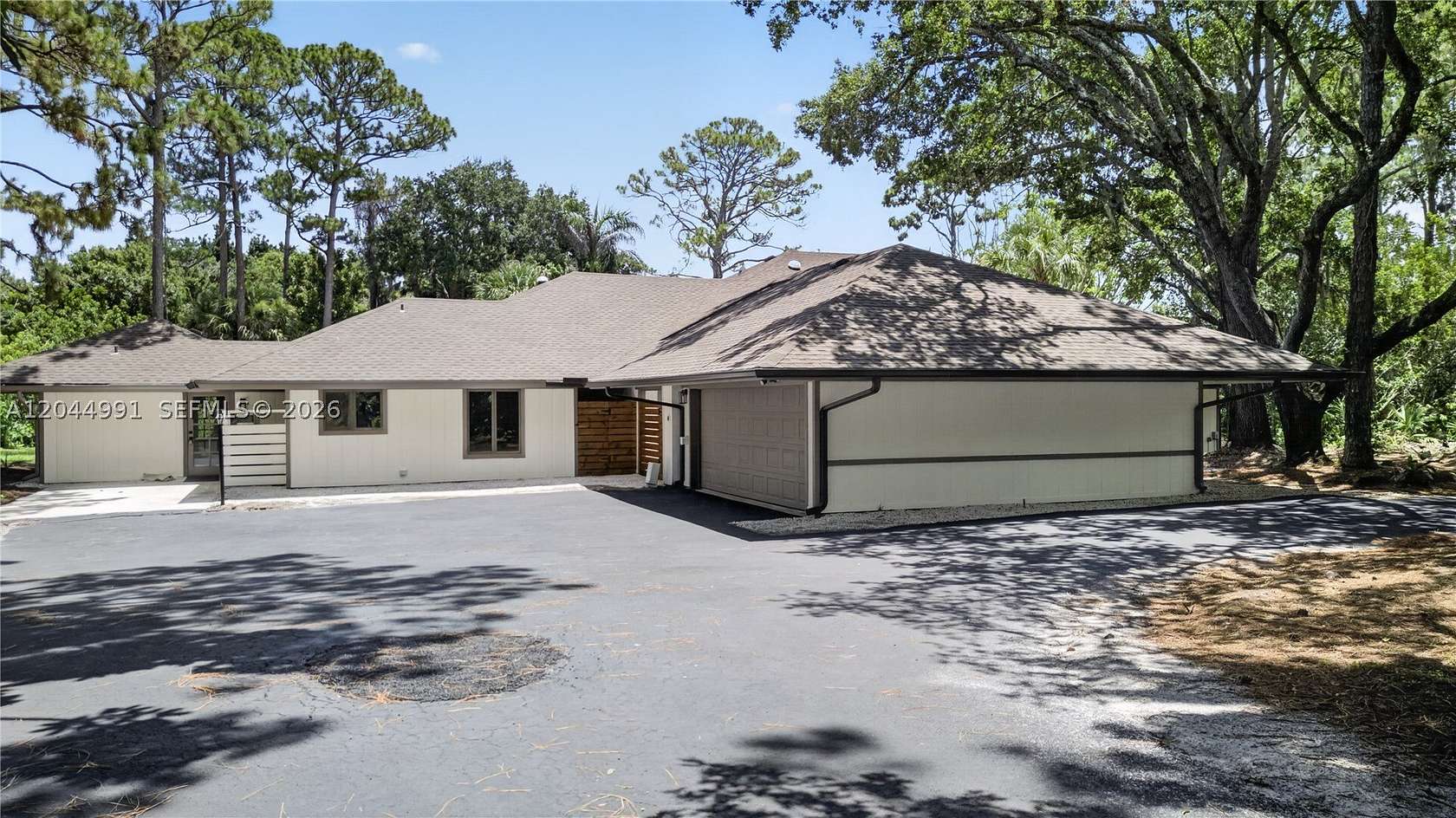 2.1 Acres of Land with Home for Sale in Palm City, Florida