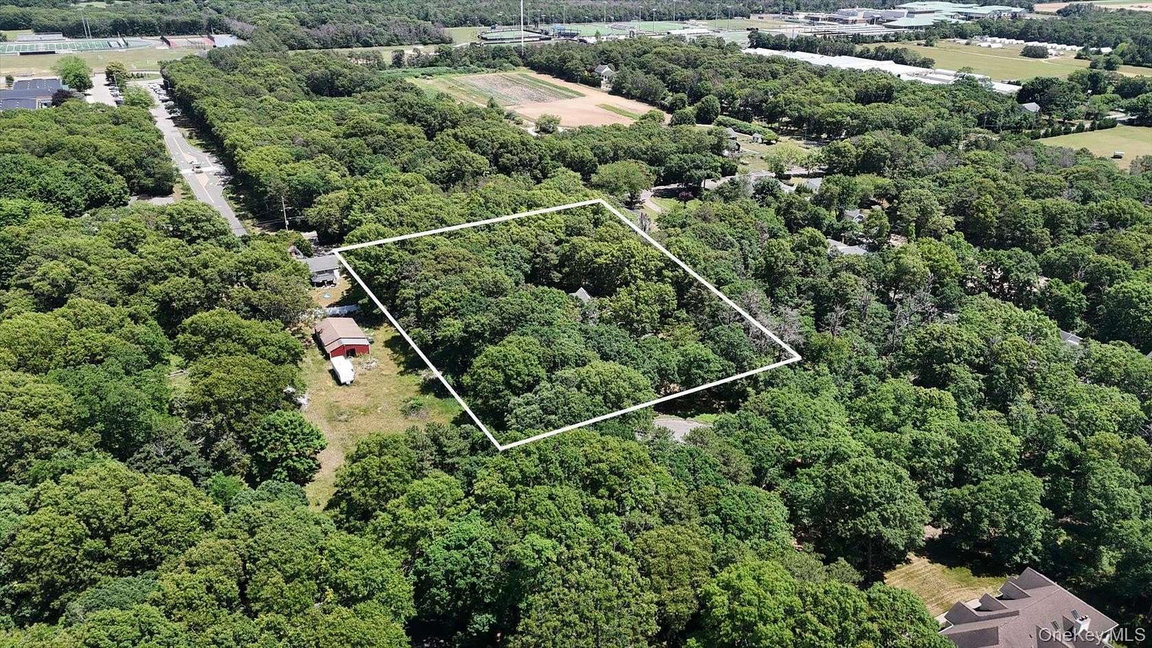 2.35 Acres of Land with Home for Sale in Manorville, New York