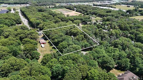 2.35 Acres of Land with Home for Sale in Manorville, New York
