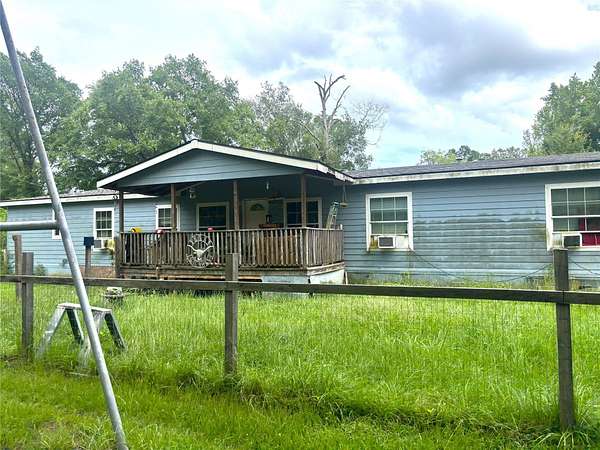 10 Acres of Land with Home for Sale in Waskom, Texas