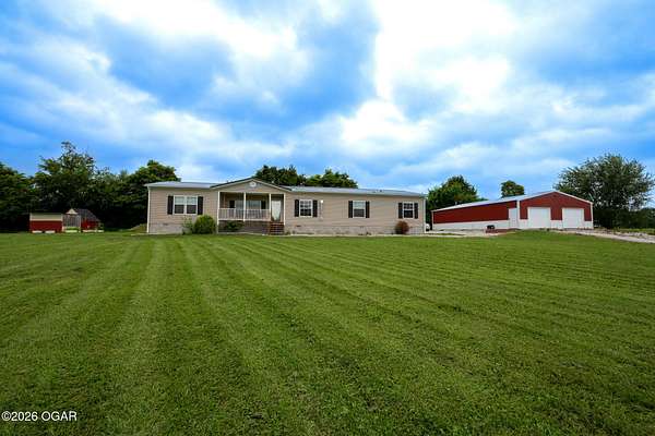 2.8 Acres of Land with Home for Sale in Cassville, Missouri