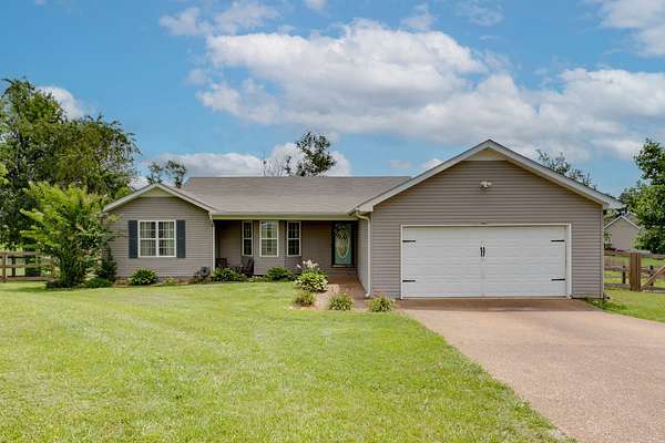 1.68 Acres of Land with Home for Sale in Bon Aqua, Tennessee