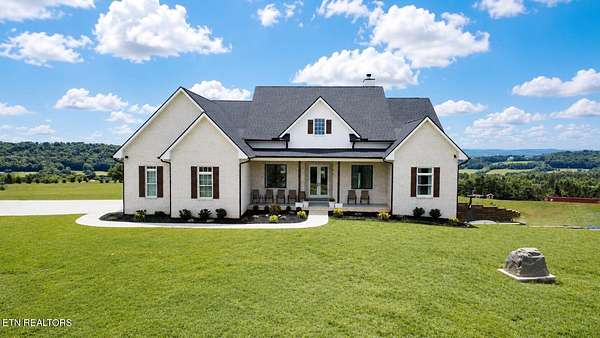 12.1 Acres of Land with Home for Sale in Philadelphia, Tennessee