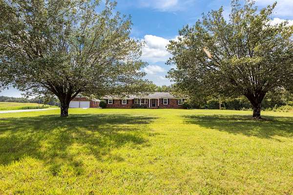 2.22 Acres of Land with Home for Sale in Camden, Tennessee