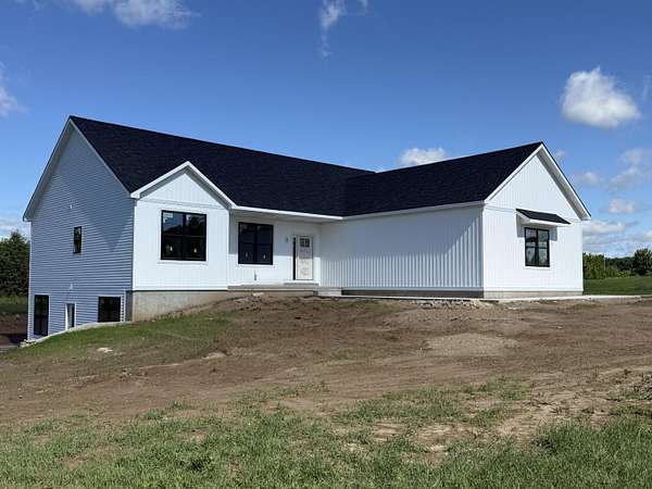 2.4 Acres of Land with Home for Sale in Saranac, Michigan