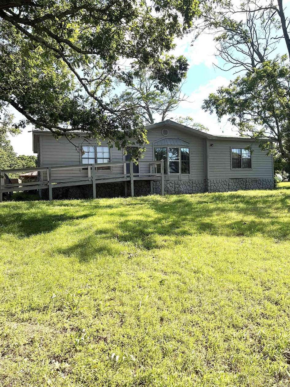 2 Acres of Land with Home for Sale in Big Flat, Arkansas
