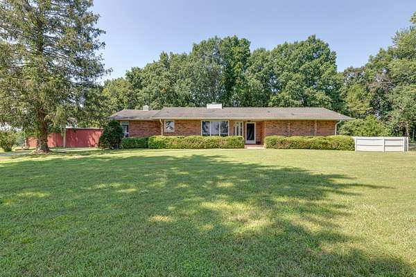 17.6 Acres of Land with Home for Sale in Charlotte, Tennessee