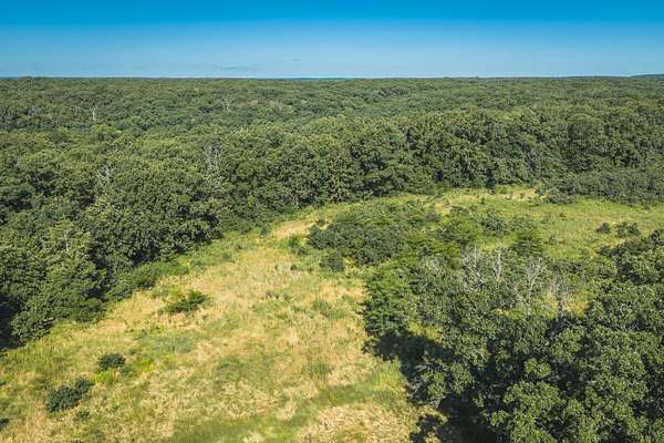 187 Acres of Land with Home for Sale in Brumley, Missouri
