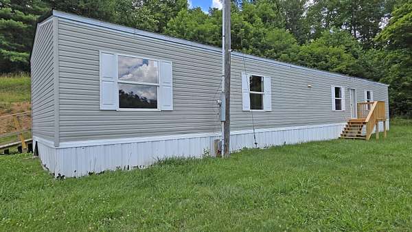 6 Acres of Land with Home for Sale in Booneville, Kentucky