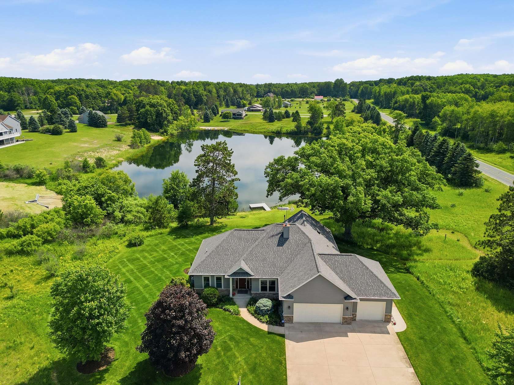 2 Acres of Land with Home for Sale in Canadian Lakes, Michigan
