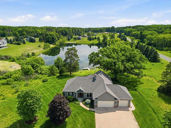 2 Acres of Land with Home for Sale in Canadian Lakes, Michigan