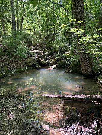 5.5 Acres of Land with Home for Sale in Fayetteville, Arkansas