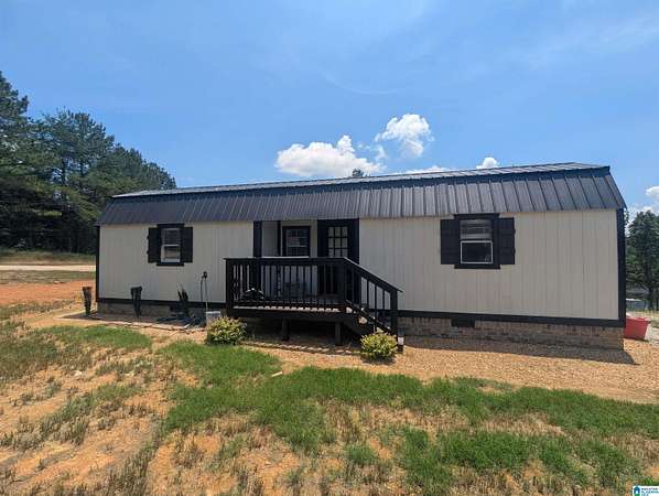 0.92 Acres of Land with Home for Sale in Munford, Alabama
