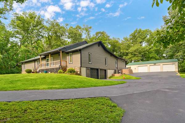 6.67 Acres of Land with Home for Sale in Brookline, Missouri