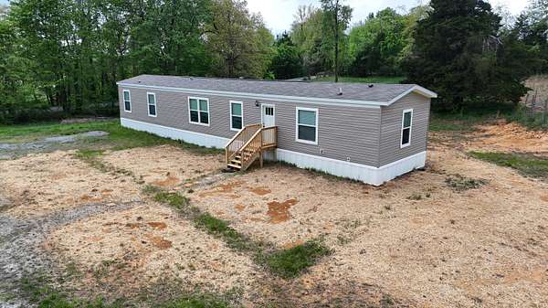 7 Acres of Land with Home for Sale in Magnolia, Kentucky