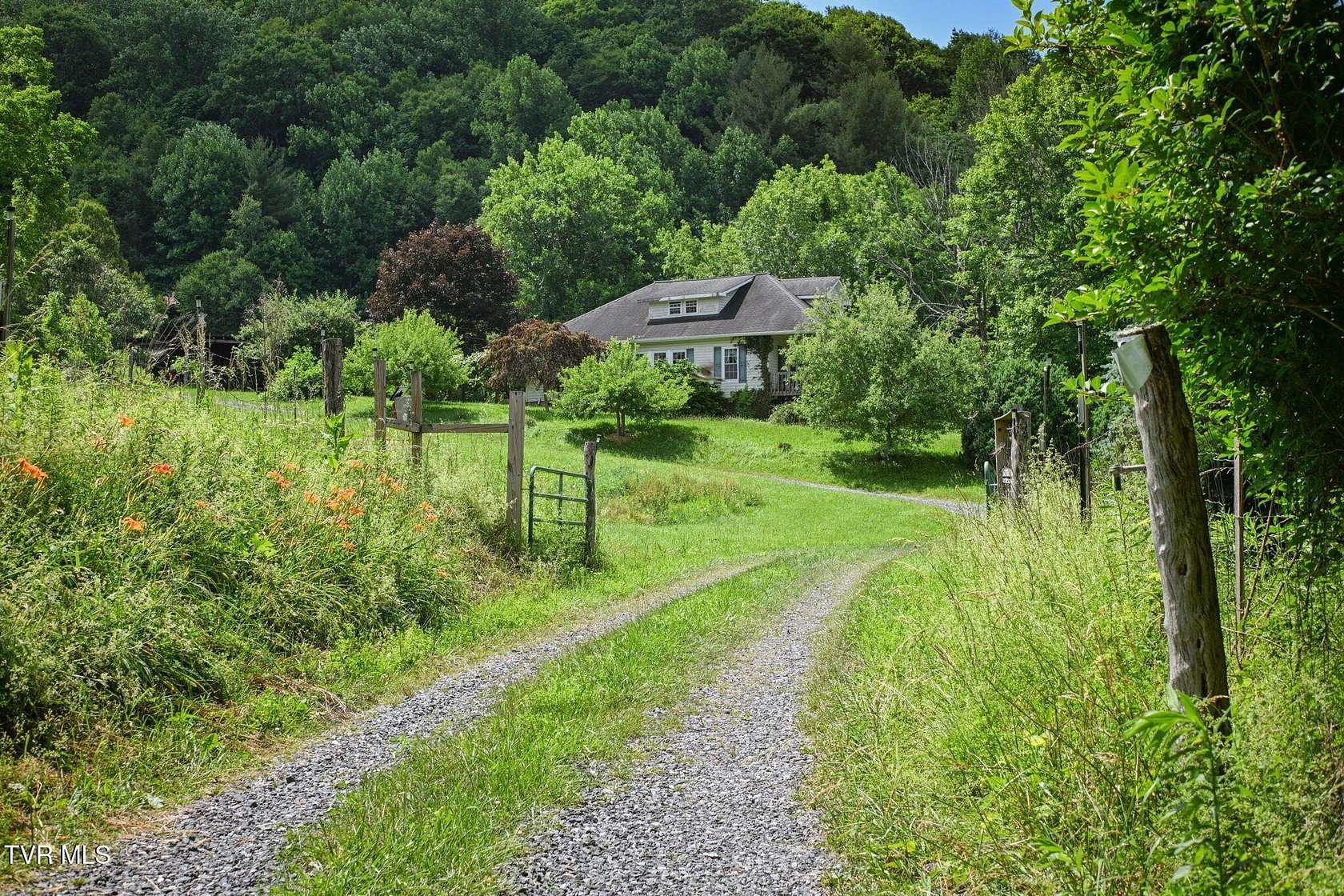 73.4 Acres of Land with Home for Sale in Roan Mountain, Tennessee