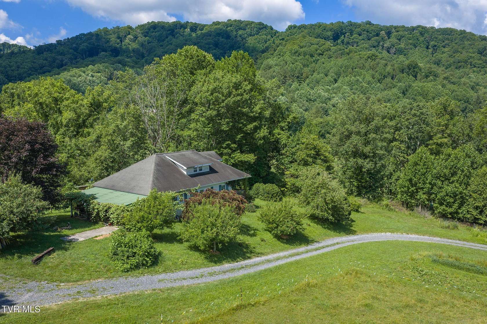 73.4 Acres of Land with Home for Sale in Roan Mountain, Tennessee