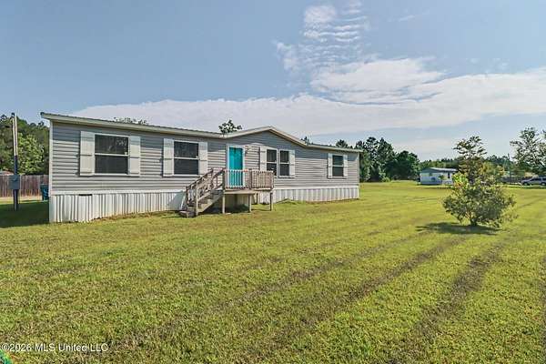 1.5 Acres of Land with Home for Sale in Vancleave, Mississippi