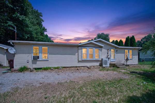 9.43 Acres of Land with Home for Sale in Jackson, Michigan