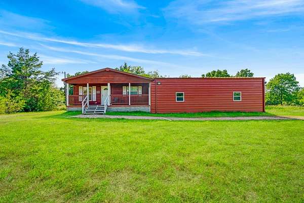 46 Acres of Recreational Land with Home for Sale in Honey Grove, Texas