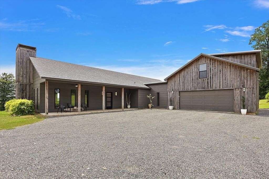 3.1 Acres of Land with Home for Sale in Garrison, Texas
