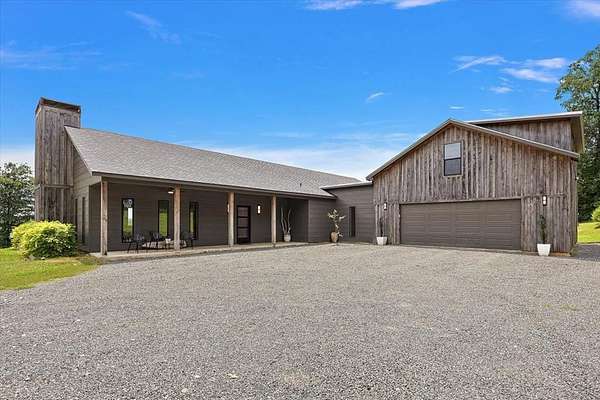 3.1 Acres of Land with Home for Sale in Garrison, Texas