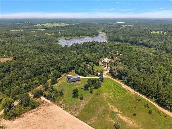3.1 Acres of Land with Home for Sale in Garrison, Texas