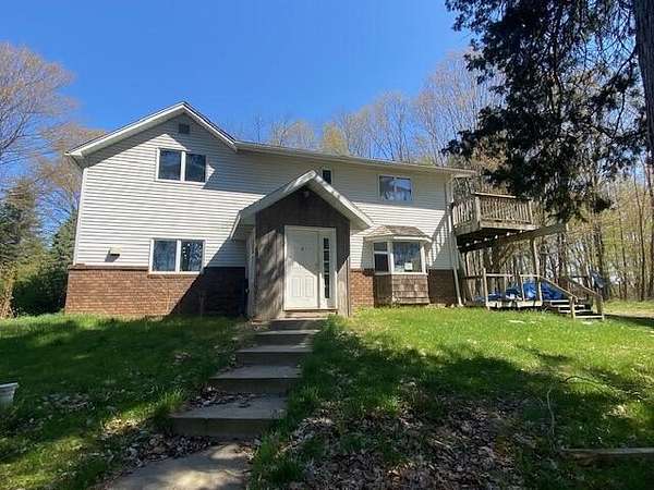 5 Acres of Land with Home for Sale in Grand Junction, Michigan