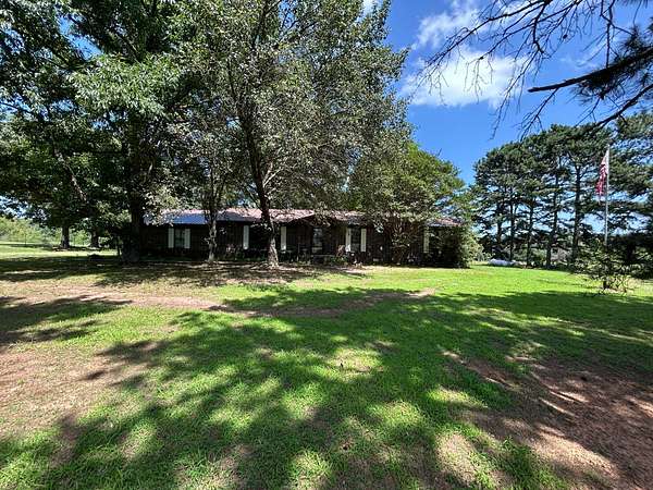 32 Acres of Land with Home for Sale in Clarksville, Arkansas