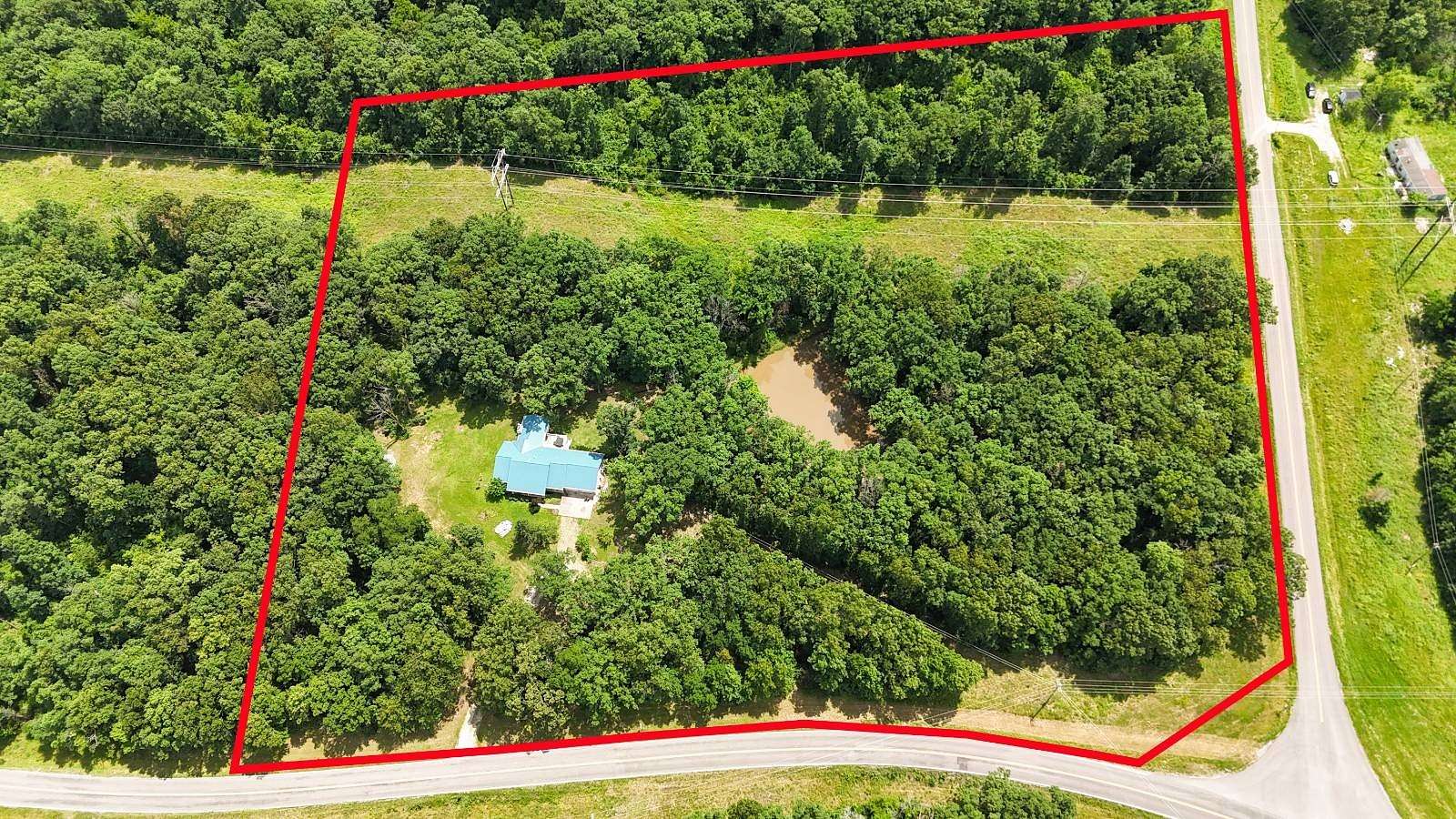 10 Acres of Land with Home for Sale in Clark, Missouri