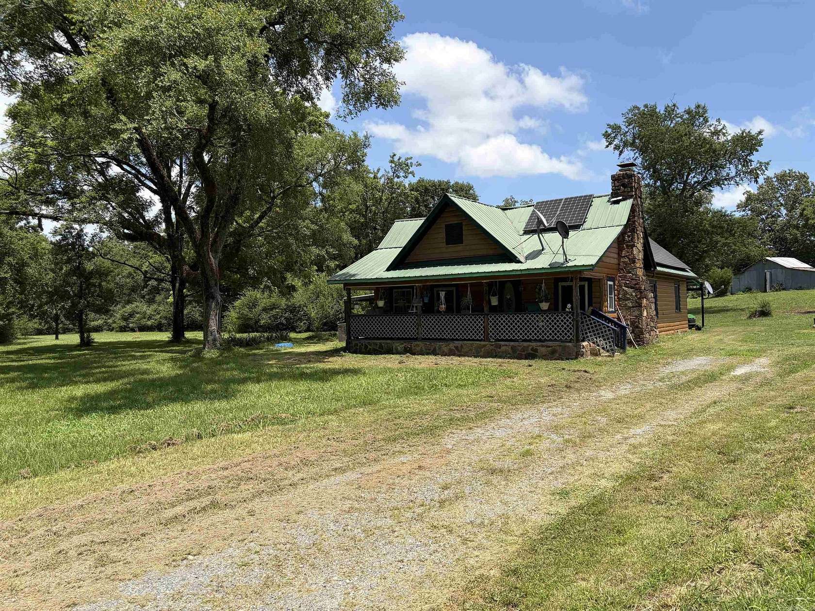 2.59 Acres of Land with Home for Sale in Mena, Arkansas