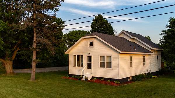 6 Acres of Land with Home for Sale in Scottville, Michigan