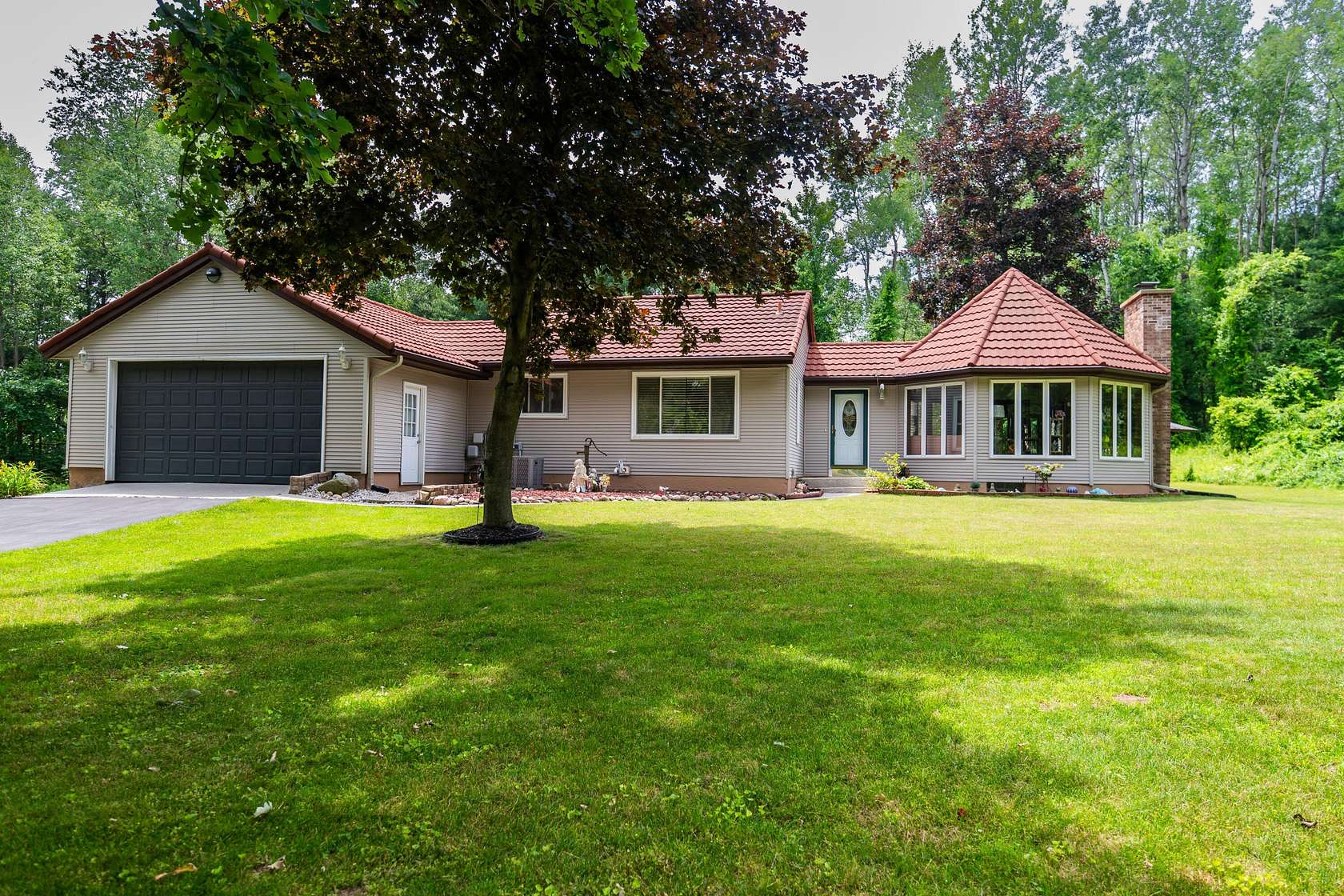 3.34 Acres of Land with Home for Sale in Ada, Michigan