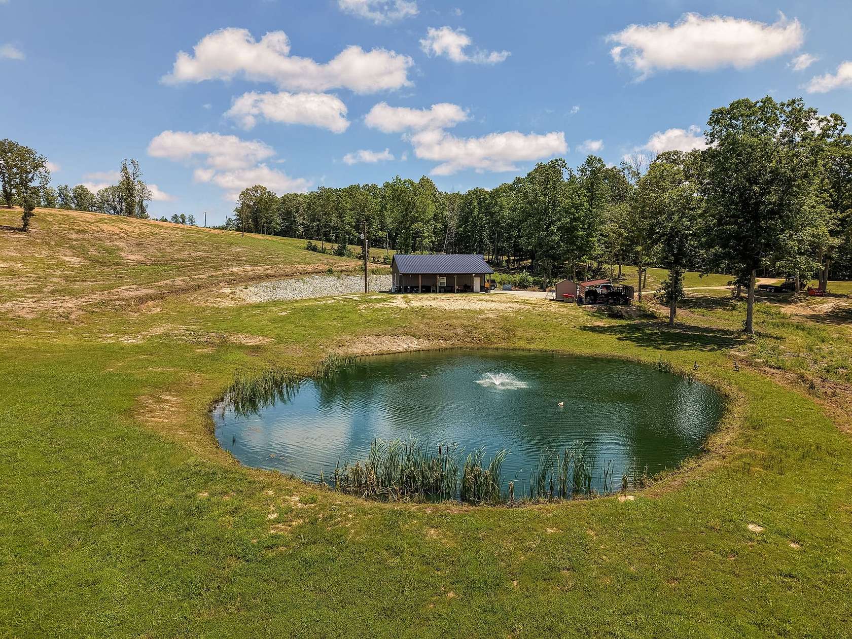 247 Acres of Recreational Land with Home for Sale in Big Sandy, Tennessee