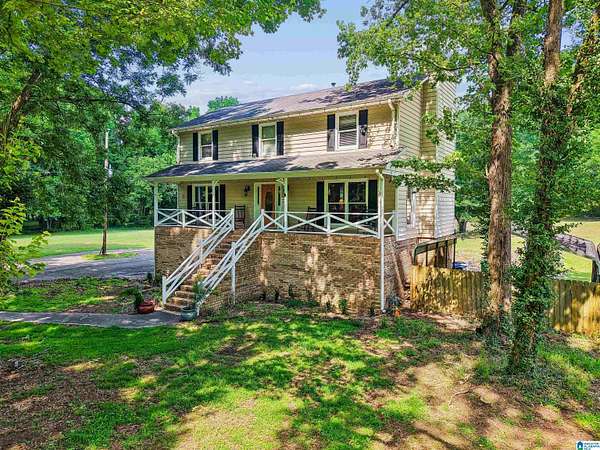 5.82 Acres of Land with Home for Sale in Leeds, Alabama
