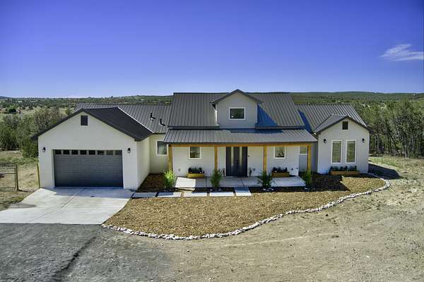 2.4 Acres of Land with Home for Sale in Sandia Park, New Mexico