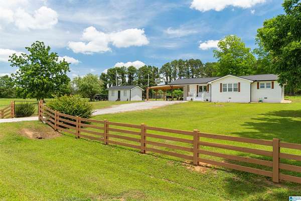 5.2 Acres of Land with Home for Sale in Roanoke, Alabama