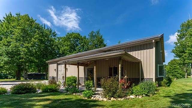32.3 Acres of Land with Home for Sale in Haring, Michigan