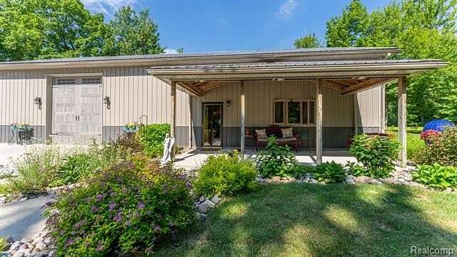 32.3 Acres of Land with Home for Sale in Haring, Michigan