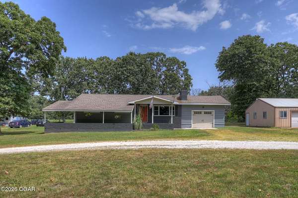 8.72 Acres of Land with Home for Sale in Neosho, Missouri