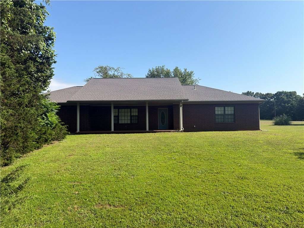 9.75 Acres of Land with Home for Sale in Clarksville, Arkansas