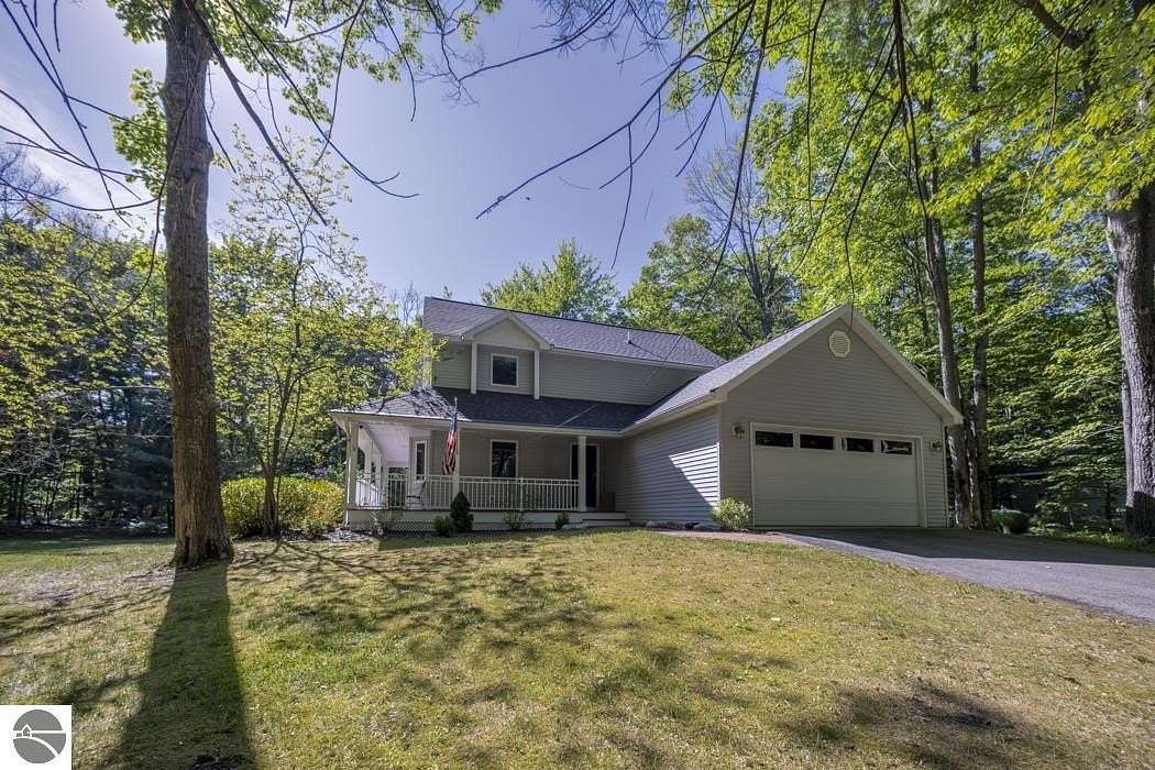 5 Acres of Land with Home for Sale in Interlochen, Michigan