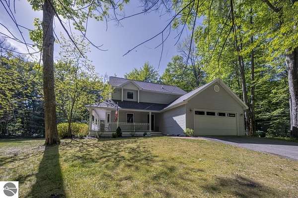5 Acres of Land with Home for Sale in Interlochen, Michigan