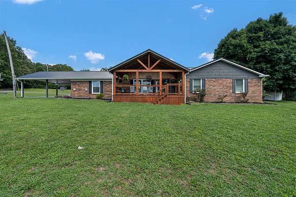 2.83 Acres of Land with Home for Sale in Scottsville, Kentucky