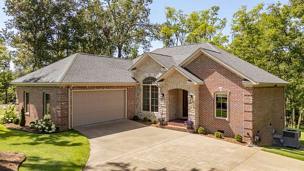 1.66 Acres of Land with Home for Sale in Savannah, Tennessee