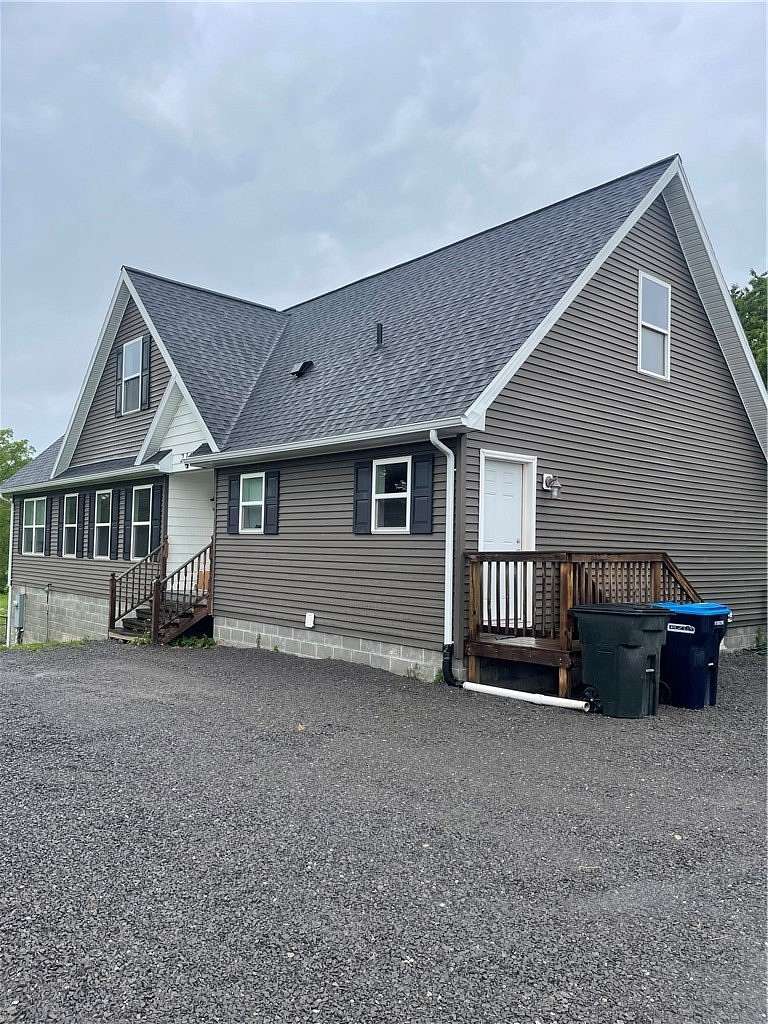 5.57 Acres of Land with Home for Sale in Scottsville, New York