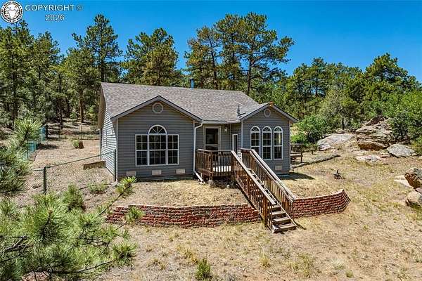 5.12 Acres of Land with Home for Sale in Cotopaxi, Colorado